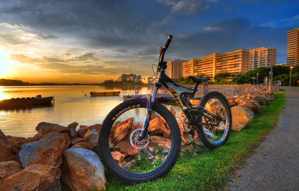 Picture sunset, bike, the city, stones, boats, river