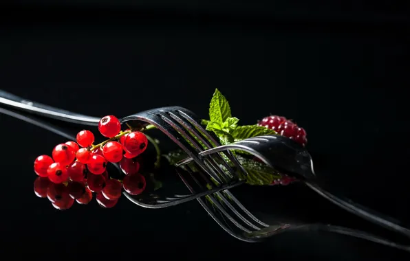 Picture berries, raspberry, currants, fork