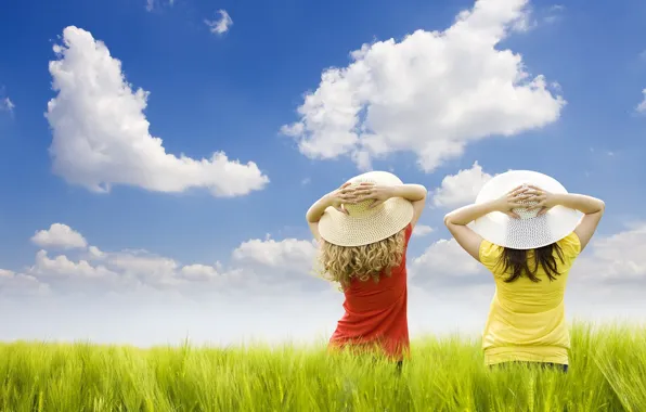 Picture field, clouds, girls, hats