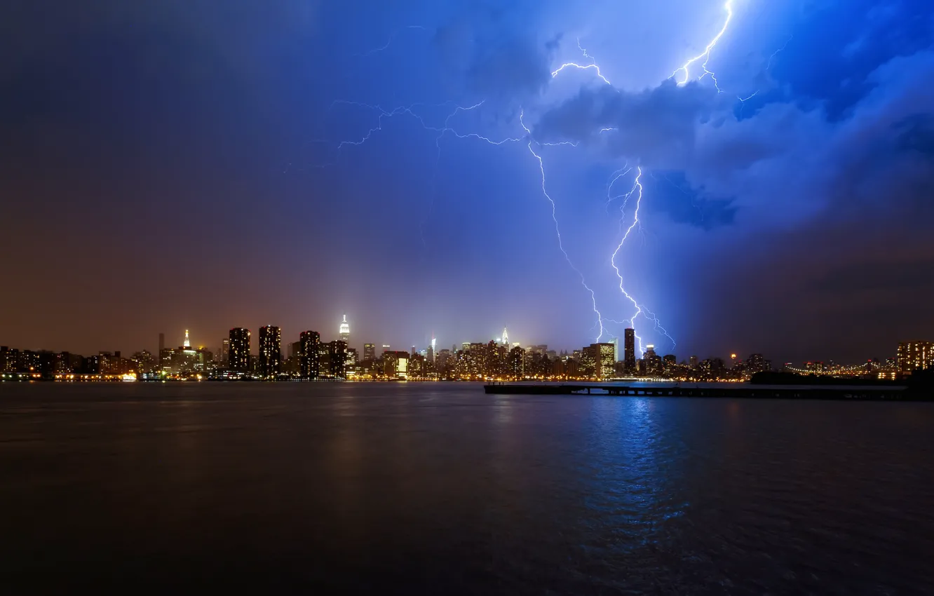 Photo wallpaper the storm, water, clouds, night, the city, lights, the ocean, lightning, skyscrapers, NYC, new York, …